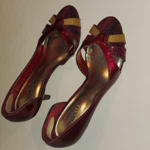 Faith mix media pump Maurices Size 7 in the color ruby red. Worn one time.